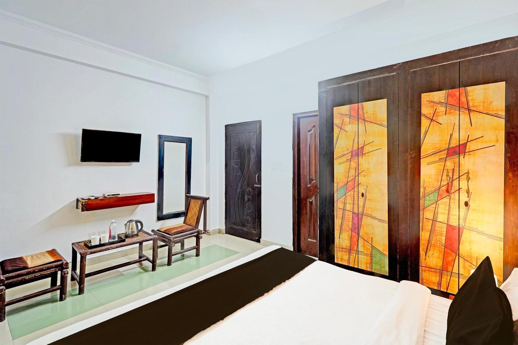Super Hotel O Palm Dehradun Extérieur photo