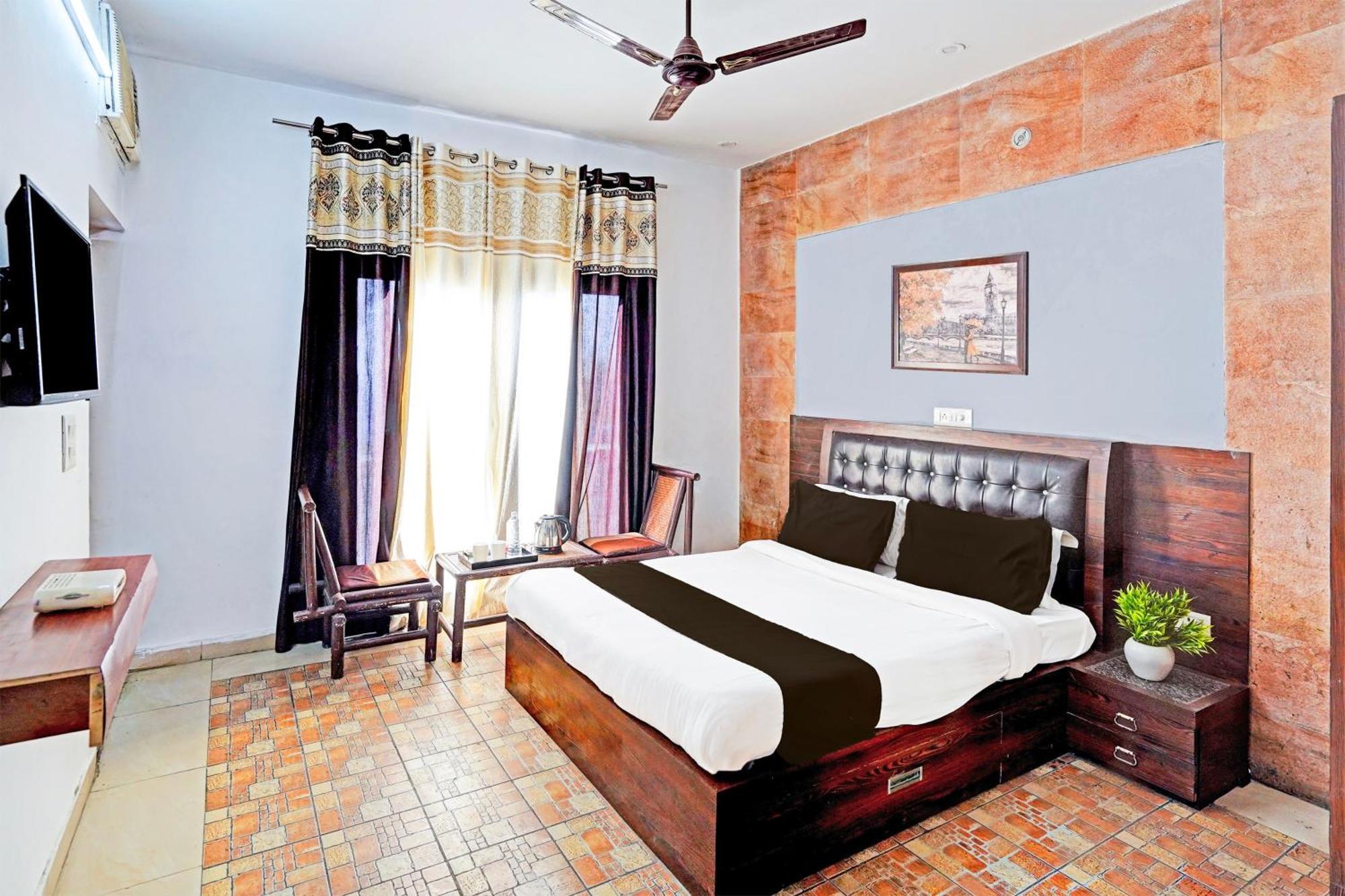 Super Hotel O Palm Dehradun Extérieur photo