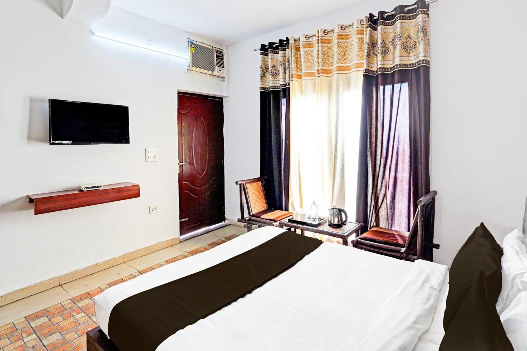 Super Hotel O Palm Dehradun Extérieur photo