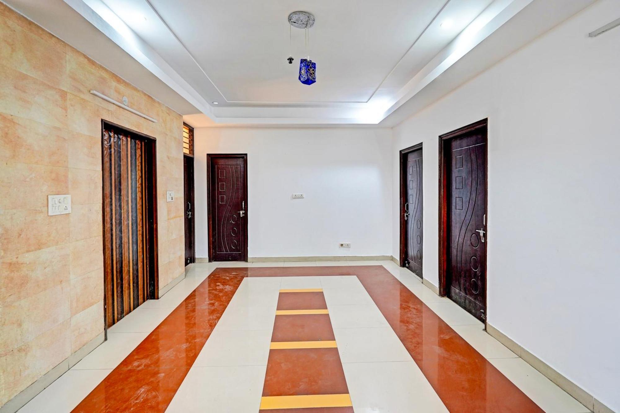 Super Hotel O Palm Dehradun Extérieur photo